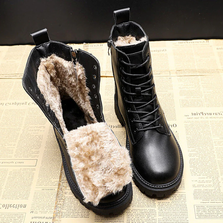 Belro leather winter boots featuring a sturdy sole, ankle height, and classic design for cold weather wear.