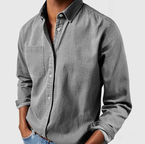 Light blue Belro cotton shirt with long sleeves and button-down front, displayed on a hanger.