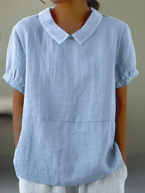 Belro solid color cotton and linen women's top with a relaxed fit, featuring short sleeves and a round neckline.