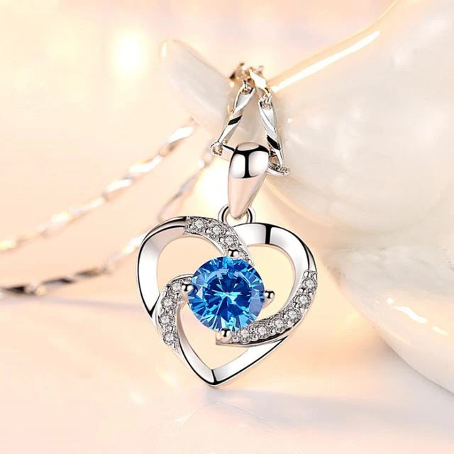 Sterling silver crystal heart necklace by Belro featuring a sparkling CZ crystal pendant, elegant jewelry accessory.