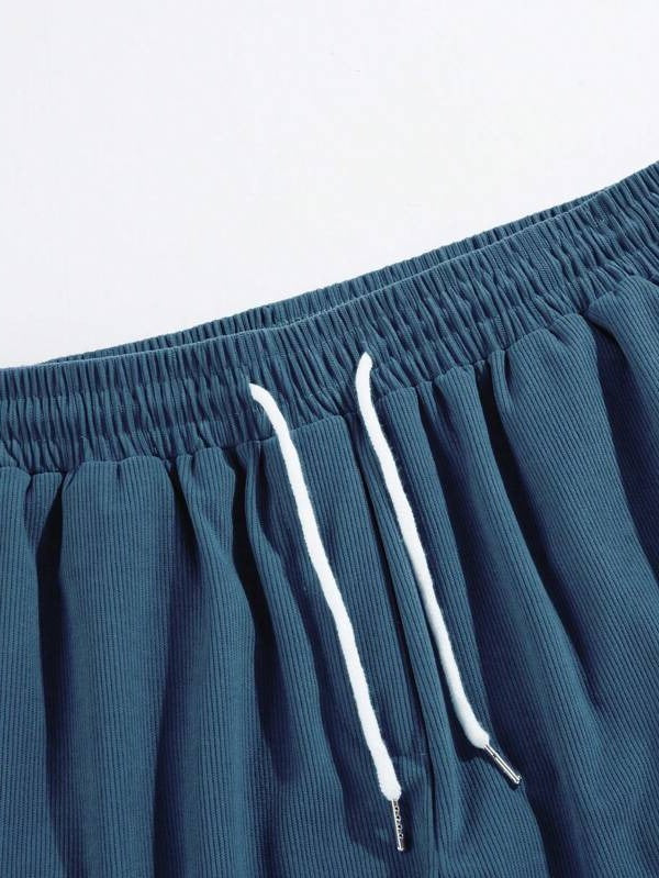 Men's Belro corduroy leisure shorts in tan, shown on a hanger, featuring a relaxed fit and classic design for casual wear.