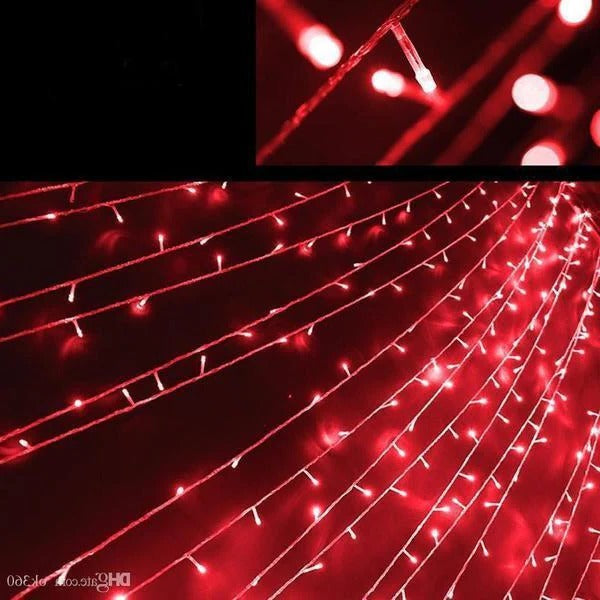Belro 17-meter string of 100 solar-powered LED fairy lights for outdoor home and garden decor, glowing at dusk.