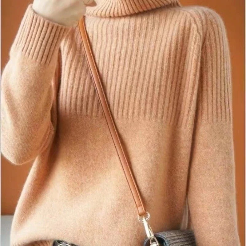 Belro women's cashmere turtleneck sweater in soft beige, featuring a cozy fit and classic ribbed collar.