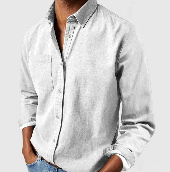 Light blue Belro cotton shirt with long sleeves and a classic collar, displayed on a hanger.