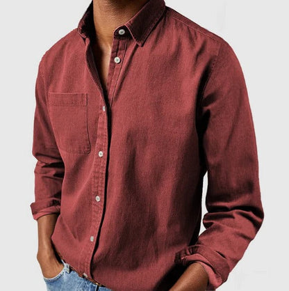 Light blue Belro cotton shirt with long sleeves and button-front design, displayed on a hanger.