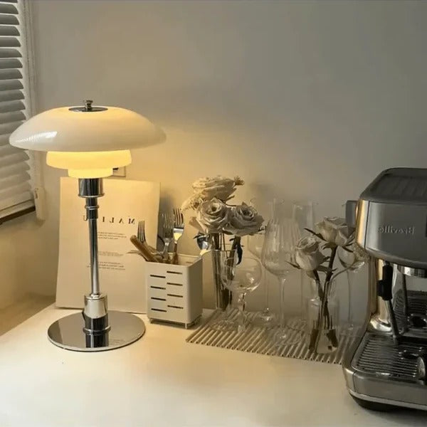 Belro Scandinavian LED table lamp with sleek design and adjustable arm, ideal for desk or bedside lighting.
