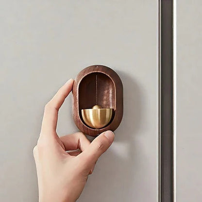 Belro wooden door chime mounted on a doorframe, featuring a traditional design for smart home doorbell integration.
