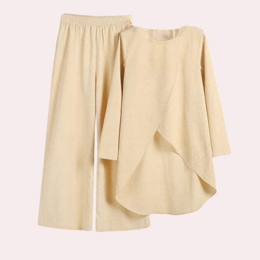Elegant ladies fashion set featuring stylish Belro pants and coordinating top, perfect for sophisticated everyday wear.