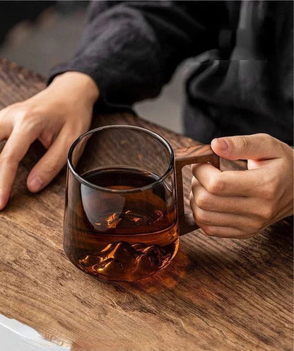 Belro elegant glass cup with handle, perfect for kitchen and dining, showcasing clear glass and a comfortable handle.
