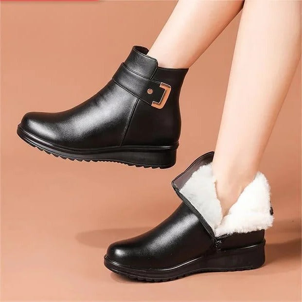 Belro orthopedic boots in black footwear, showing supportive design and sturdy sole for comfort and stability.
