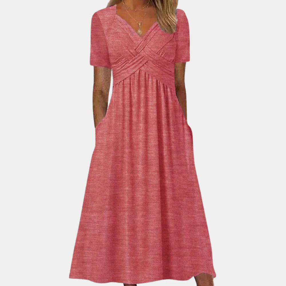 Elegant ladies summer dress with V-neck by Belro, showcasing lightweight fabric and stylish design perfect for warm weather.