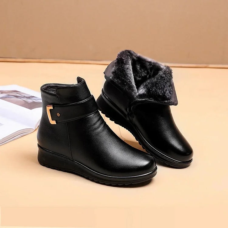 Belro orthopedic boots in black footwear, featuring supportive design and sturdy soles for foot comfort and injury recovery.