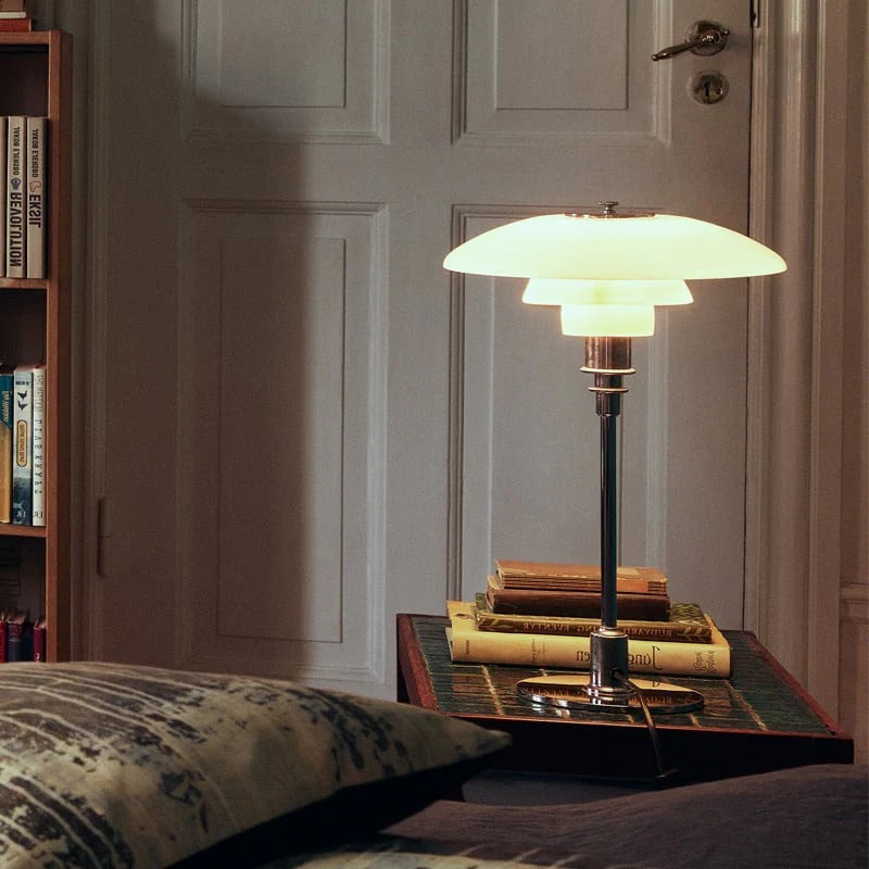 Belro Scandinavian LED table lamp with sleek modern design, illuminated on a desk, perfect for home or office lighting.