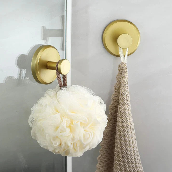 Belro Instant Grip Suction Hooks attached to a bathroom tile for easy home organization and storage.