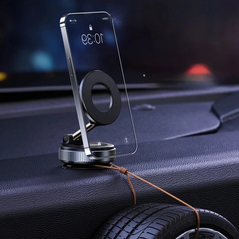 Belro rotating magnetic car phone holder attached to car dashboard, holding a smartphone securely during travel.