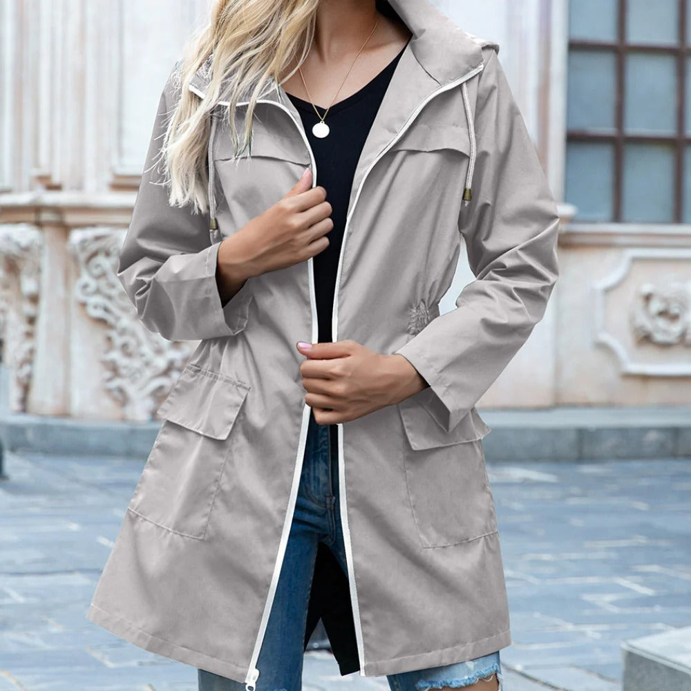 Belro stylish women's zipper trench coat, beige color, mid-length with belt and collar, suitable for casual or formal wear.