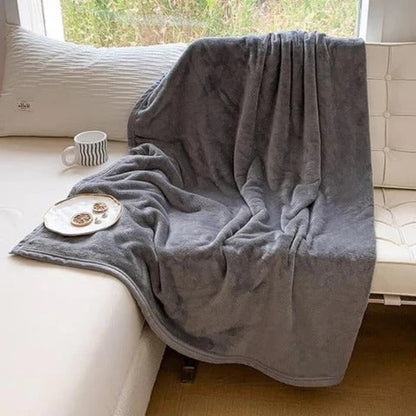 Belro waterproof warm blanket shown in a cozy home setting, featuring soft, insulating fabric ideal for cold weather.