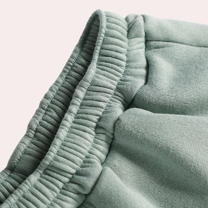 Belro women's two-piece tracksuit in soft sleepwear fabric, featuring a comfortable hoodie and matching pants.