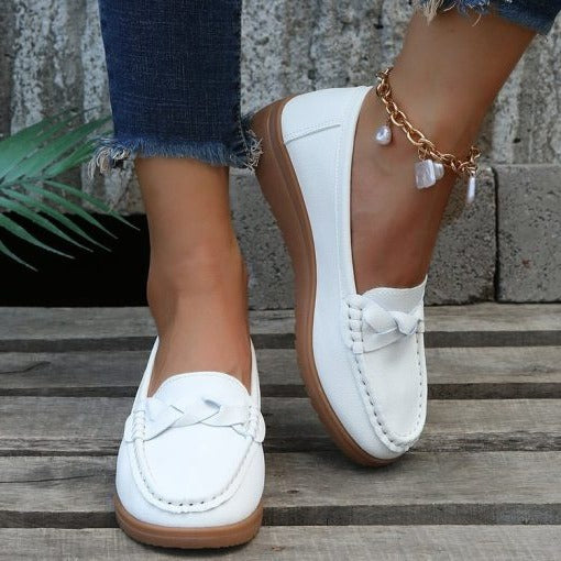 Belro women's soft leather slip-on loafers, comfortable walking slippers with sleek design and slip-on style.