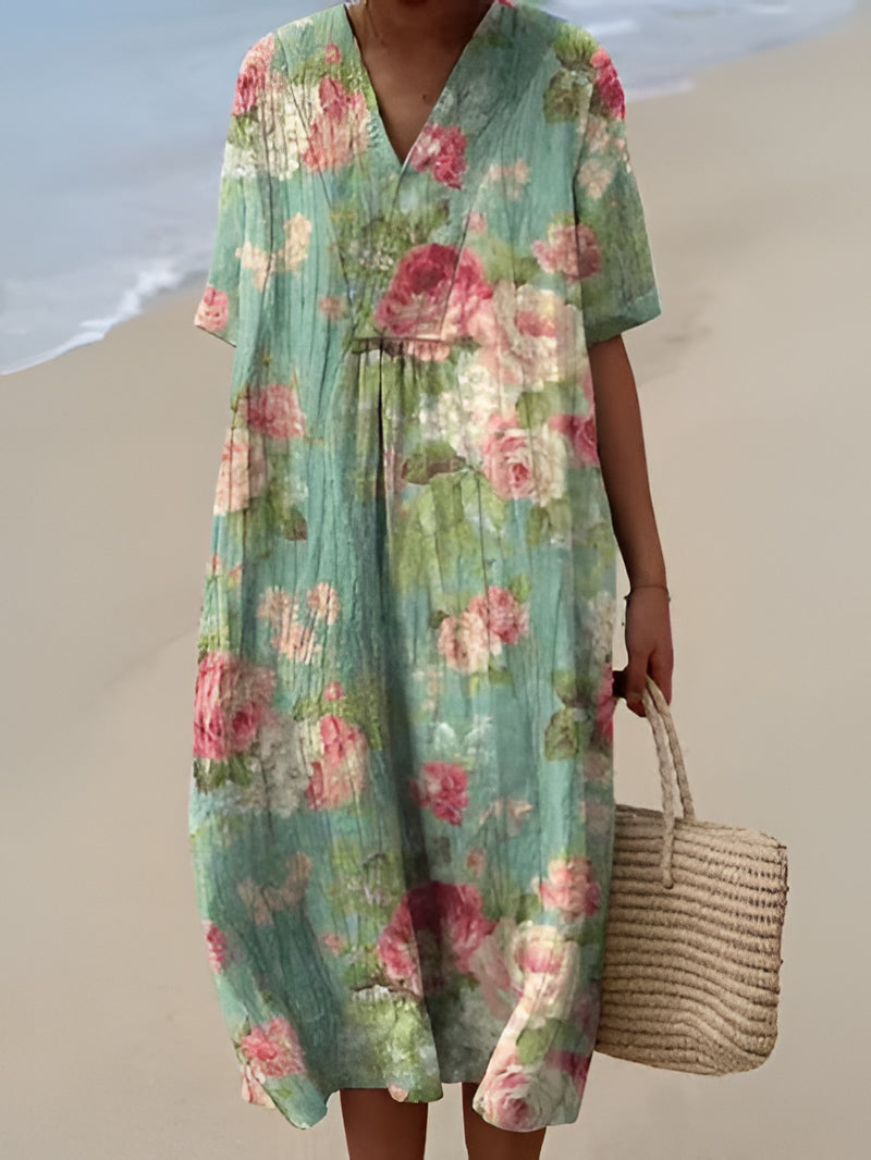Belro summer dress with floral pattern, sleeveless design, and lightweight fabric perfect for warm weather.