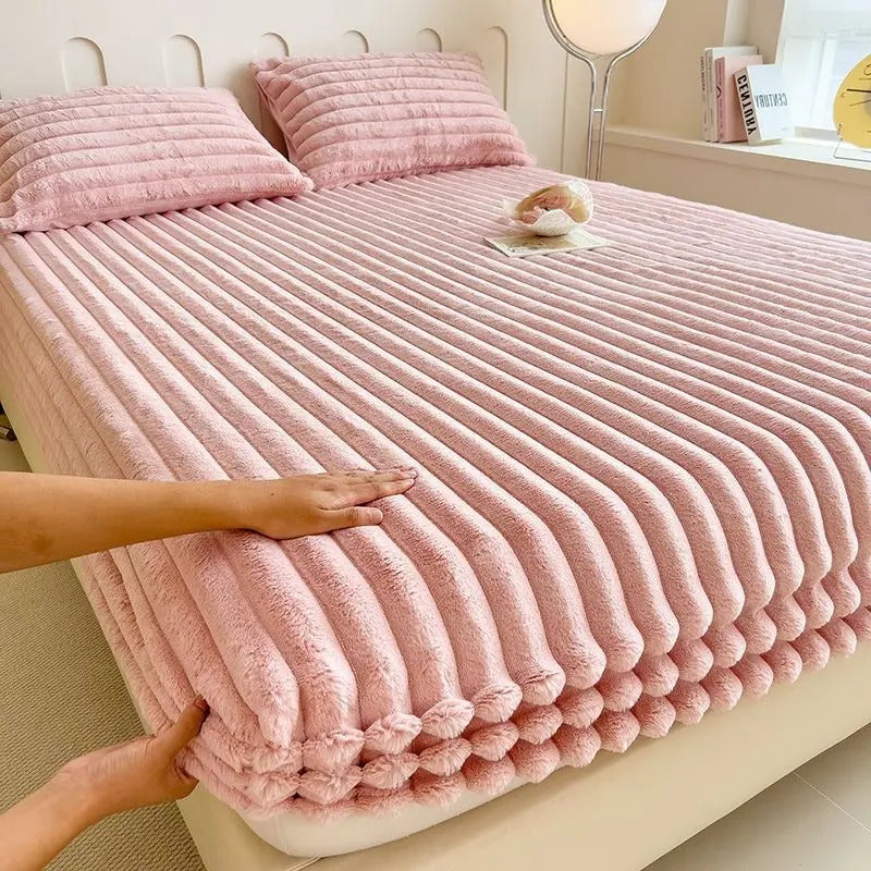 Belro ultra-soft luxury fitted bed sheet in a cozy bedroom setting, showcasing smooth fabric and a snug fit on a mattress.