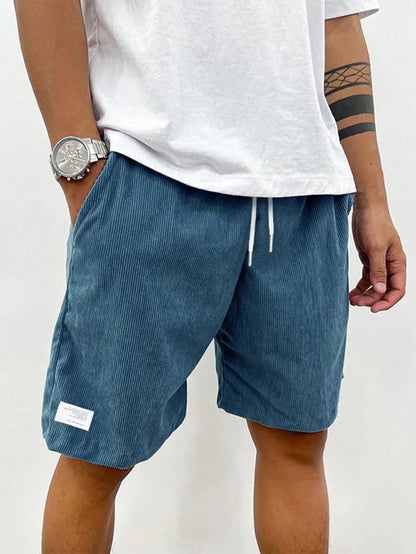 Men's Belro corduroy leisure shorts in a neutral color, displayed folded on a flat surface.