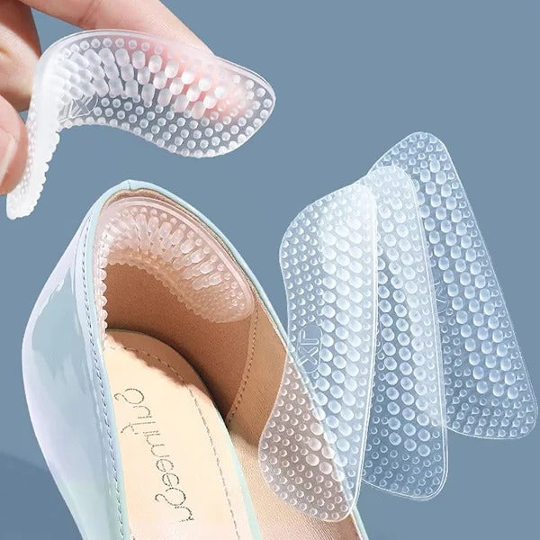 Belro silicone heel grips for footwear, showing soft, transparent cushioning to prevent heel slipping and improve shoe comfort.