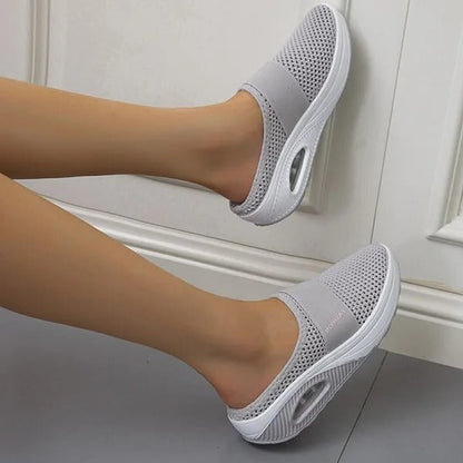 Belro orthopedic wedge sandals with supportive straps, designed for comfort and style as casual footwear or accessories.