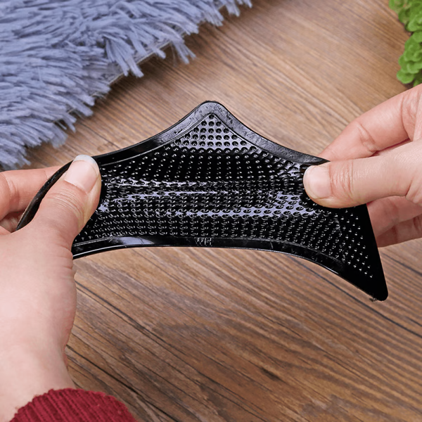 Belro non-slip rug gripper securing a plush rug on hardwood floor, prevents slipping and shifting for safety and stability.