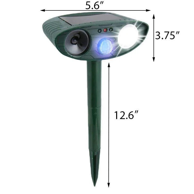 Belro solar-powered ultrasonic animal repellent device outdoors in a garden, designed to deter pests effectively.