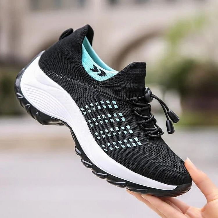 Belro orthopaedic sneakers in neutral tones, featuring supportive soles and comfortable design for foot health and everyday wear.