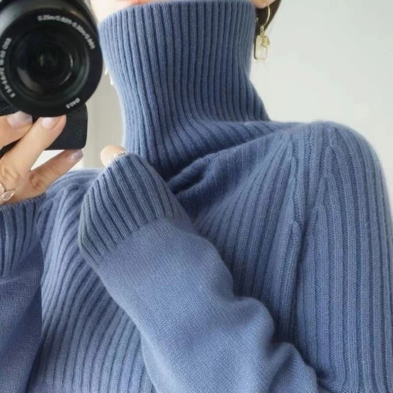 Belro women's cashmere turtleneck sweater, soft and cozy, featuring a classic design in neutral color.