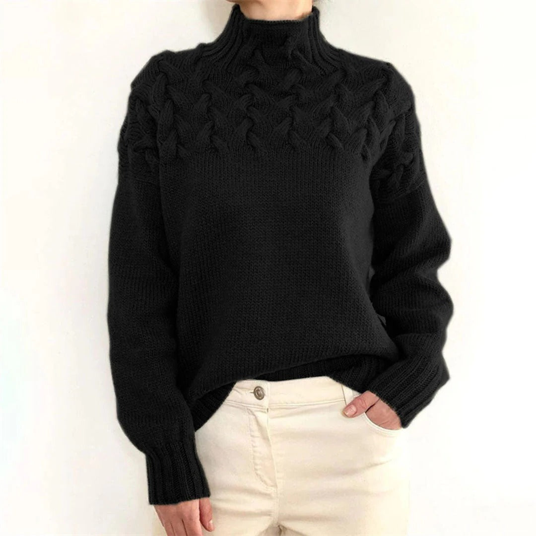 Women's Belro knitted turtleneck sweater in cozy wool, featuring a fitted design and ribbed cuffs on a neutral background.