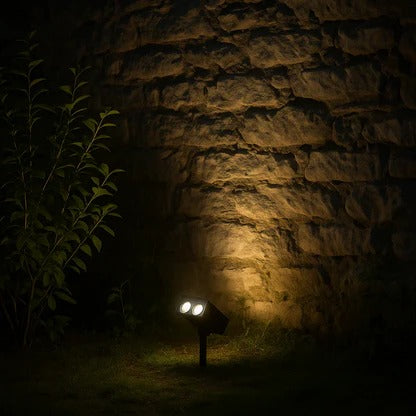 Belro Solar LED Multi-Zoom Spot Light installed outdoors, illuminating garden area with adjustable zoom feature.