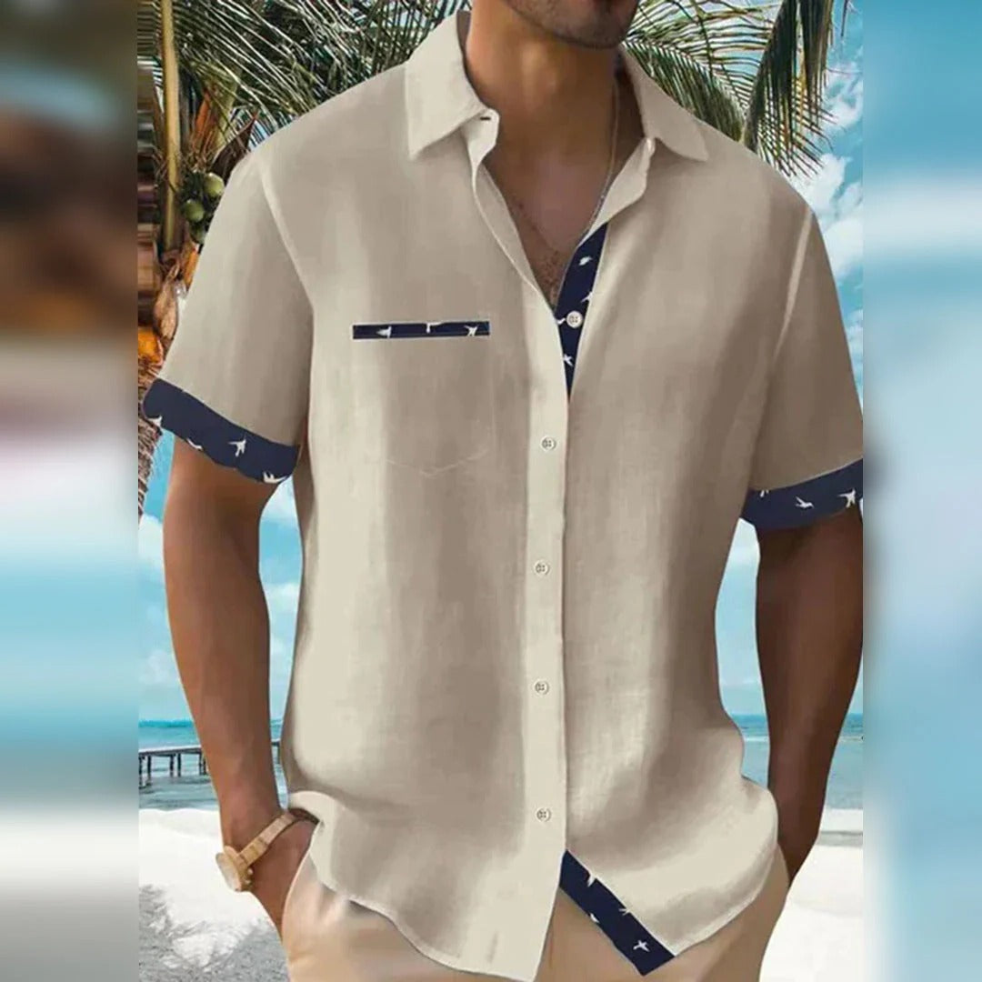 Men's elegant Belro shirt with a classic collar and button front, shown laid flat on a neutral background.