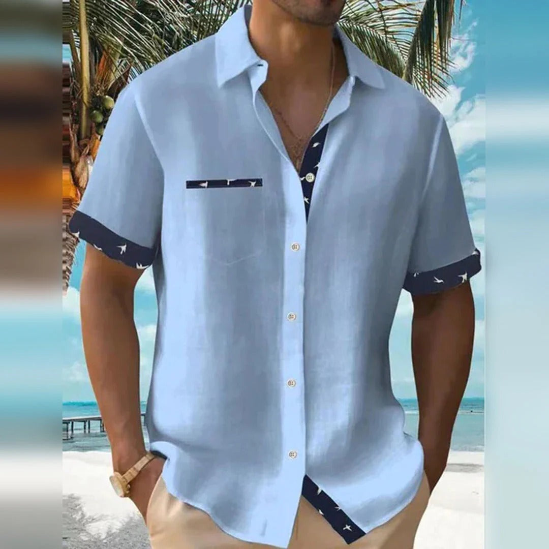 Elegant men's Belro shirt featuring a classic design, with a collar and button-down front, displayed on a hanger.