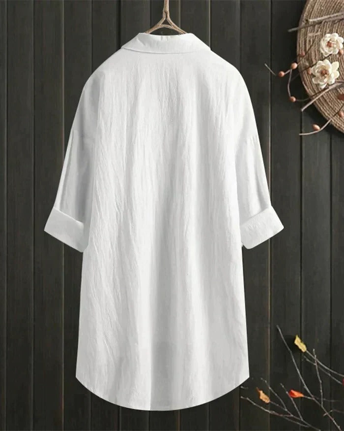 Women's white linen blouse by Belro, featuring a relaxed fit, short sleeves, and lightweight breathable fabric, perfect for casual wear.