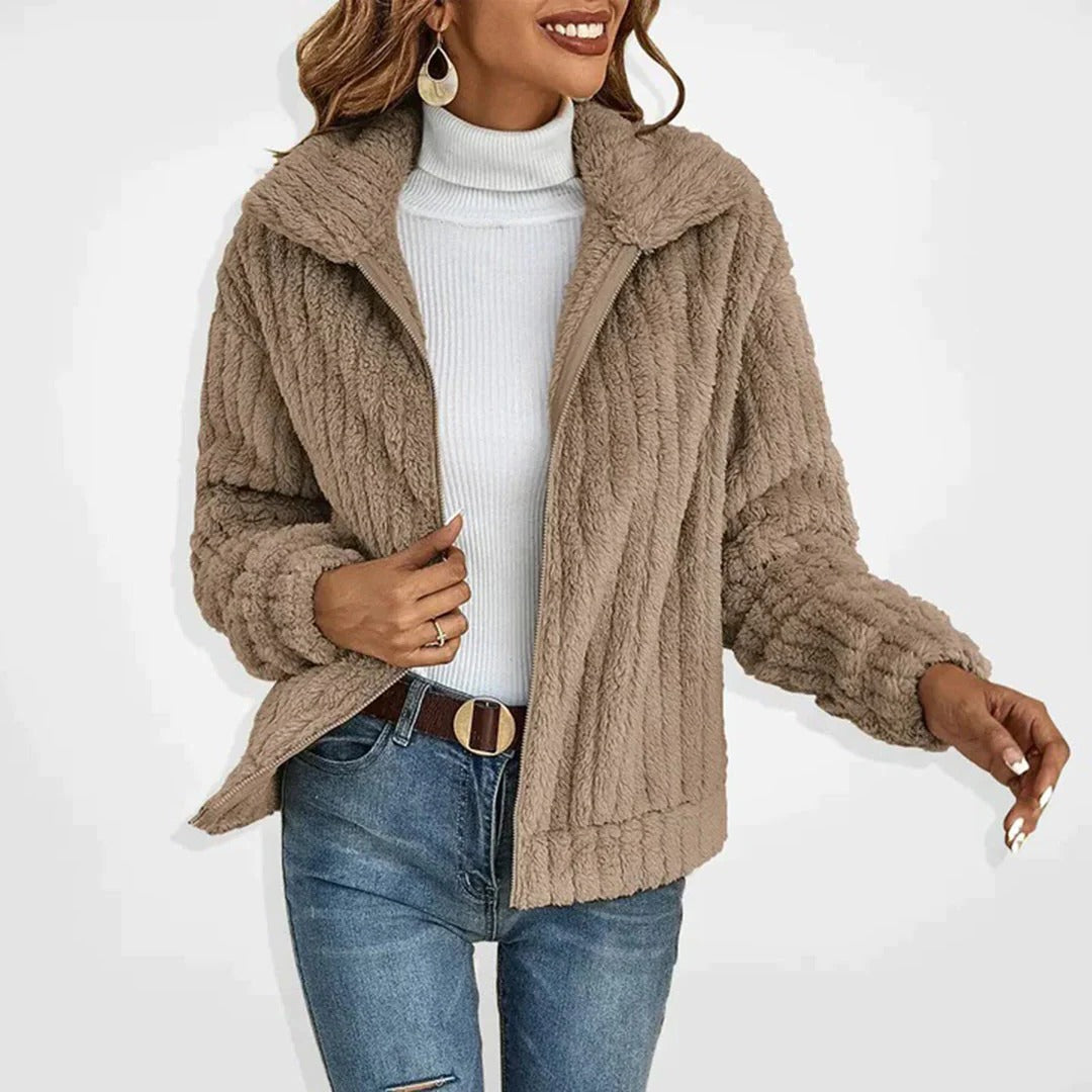 Women's long elegance fleece cardigan by Belro, shown in a cozy, soft fabric with a flowing design, perfect for stylish warmth.