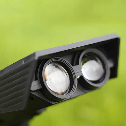 Belro Solar LED Multi-Zoom Spot Light installed outdoors, highlighting its adjustable zoom and sleek design for home and garden lighting.