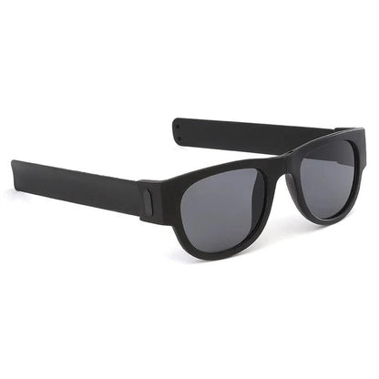 Belro Folding Slap Sunglasses with black frames and dark lenses, compact and portable eyewear accessory.