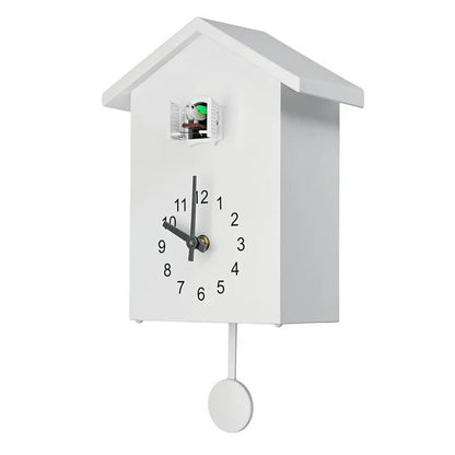 Belro cuckoo clock with decorative design, featuring intricate wood details and traditional home decor style.