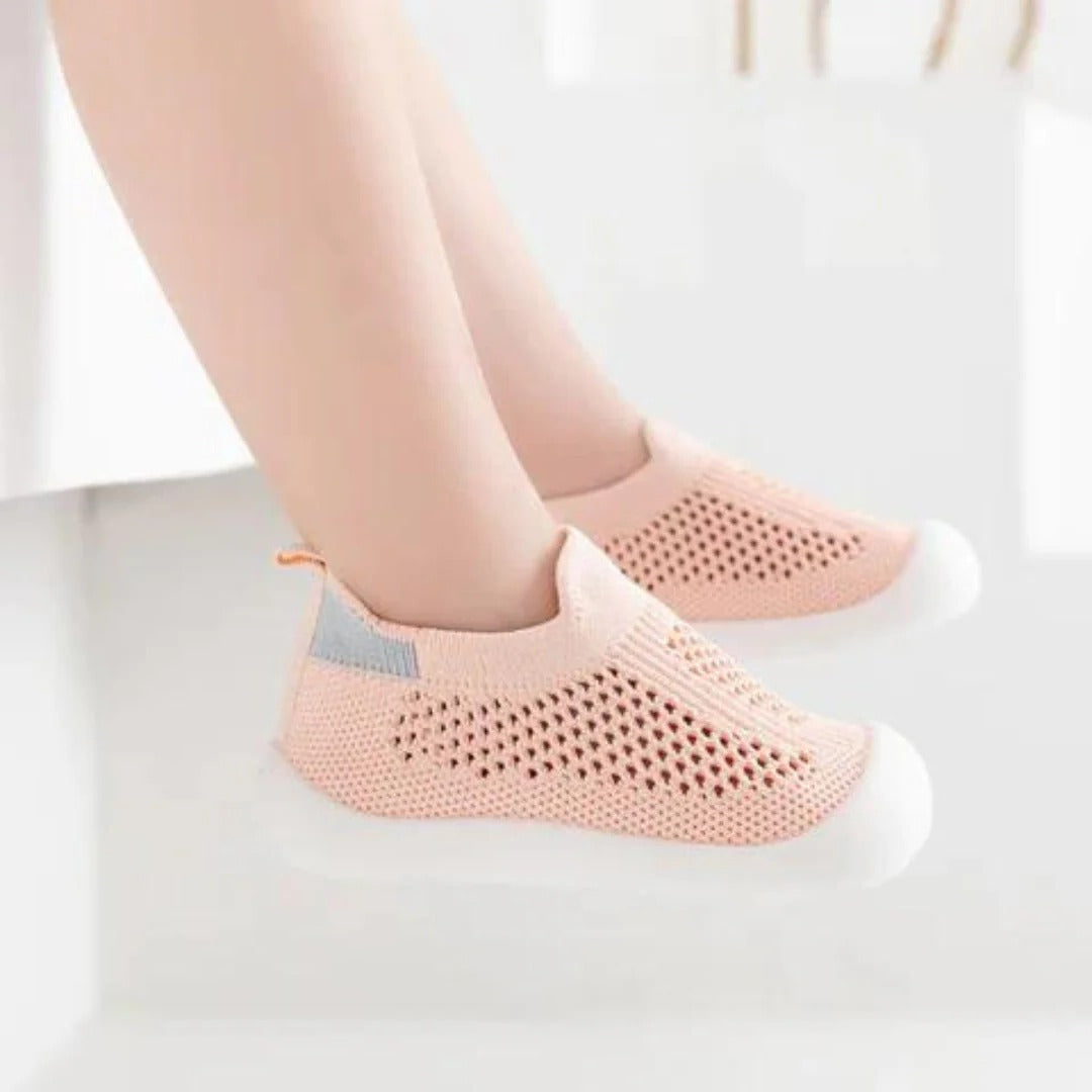 Belro anti-slip kid's shoe socks with grip soles, soft fabric, and colorful patterns for safety and comfort in children's footwear.