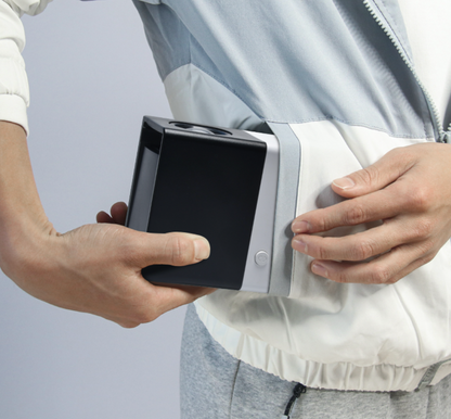 Belro mini movie projector showing a colorful image on a wall, compact electronic device for home entertainment.