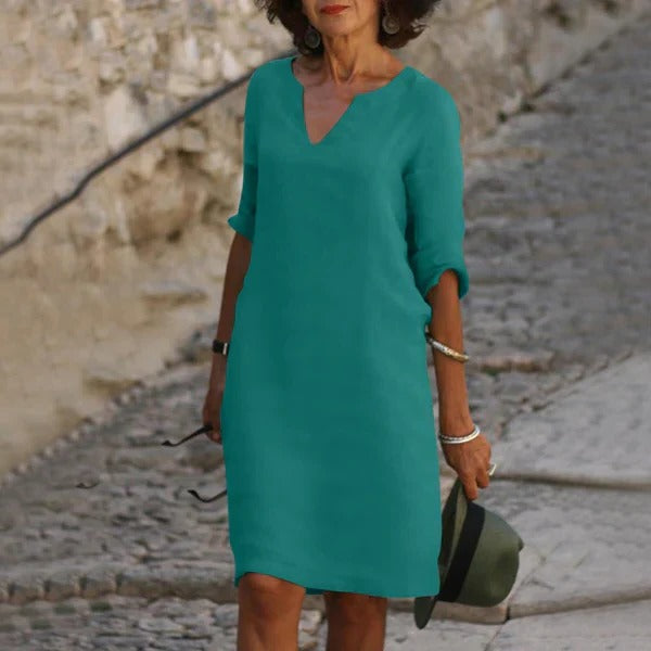 Belro V-neck three-quarter sleeve dress, stylish and comfortable clothing with a flattering fit, shown on a model.