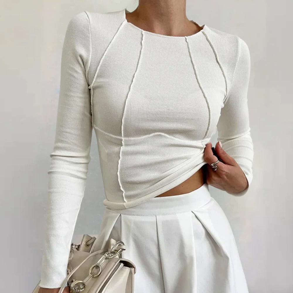 Belro simple long sleeve women's top in soft fabric, shown in a neutral color, casual fit, and classic design.
