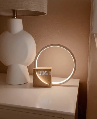Belro Sunrise Simulation Alarm Clock displaying a digital clock face with a sunrise light feature for bedroom decor.
