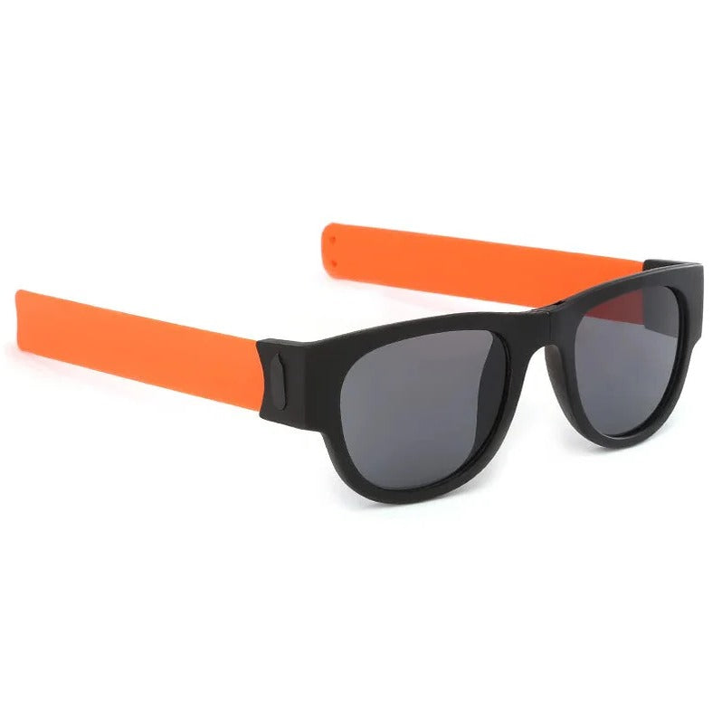 Belro folding slap sunglasses with black frames and dark lenses, showcasing compact design and hinge mechanism.