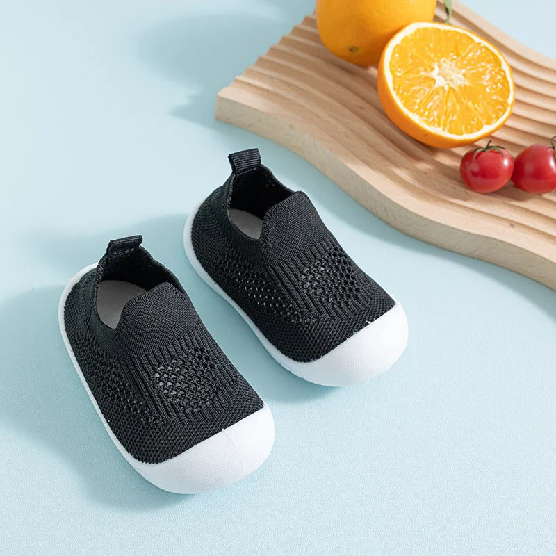 Belro anti-slip kids' shoe socks, colorful with grip soles, designed to keep children safe and comfortable while walking.