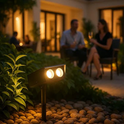 Belro Solar LED Multi-Zoom Spot Light installed outdoors in a garden, highlighting its adjustable zoom feature for outdoor lighting.