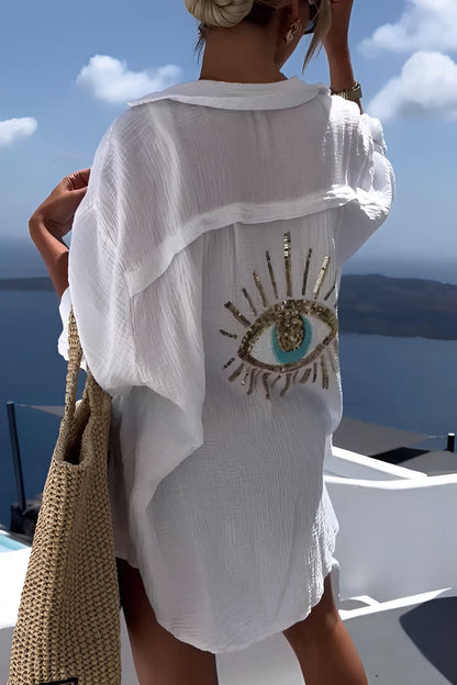 Belro evil eye shirt with sequin bead embellishments, stylish clothing featuring vibrant patterns and intricate detailing.